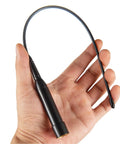Hand holding Dual Band Car Ham Radio Antenna With Magnetic Base And Ground Plane Kit Covers 136-174MHz And 400-470MHz Soft Whip
