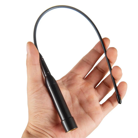 Hand holding Dual Band Car Ham Radio Antenna With Magnetic Base And Ground Plane Kit Covers 136-174MHz And 400-470MHz Soft Whip