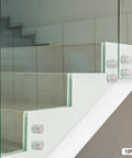 10 Pack 304 Stainless Steel Glass Railing Standoffs With Slick Wire Draw Texture mounted on glass staircase panels.