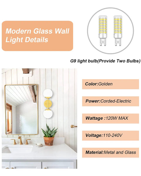 Gold Globe Wall Sconce With Two Lights shown in a bathroom with a mirror, white walls, and vanity. Two G9 bulbs included.