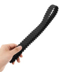 Hand holding black rubber tank track from Two Pack Rubber Tank Tracks For RC Chassis Long Wide DIY Replacement For Crawlers