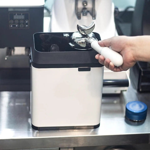 Automatic Electric Coffee Handle Cleaner And Knock Box For Busy Baristas Quick Portafilter Ground Shaker 150 Watt Motor in use.