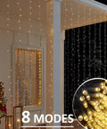 Epic Outdoor 40Ft By 10Ft 800 LED Curtain Lights With Plug In Hanging String Lights illuminating a patio at night