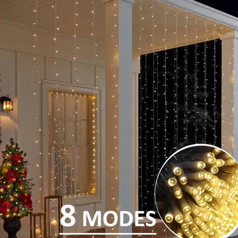 Epic Outdoor 40Ft By 10Ft 800 LED Curtain Lights With Plug In Hanging String Lights illuminating a patio at night