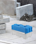 Hollow Brick Molds For Concrete Reusable Plastic Paver Mold in blue and white for DIY garden walls and patio decor on concrete site
