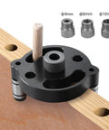 Self Centering Doweling Jig Handheld Drill Guide Pro Grade For Precise Furniture Assembly And Woodworking Holes Wood Panel Hole Locator With Aluminum Alloy Construction For Accurate Dowels And Easy Drill Alignment, shown on a wood panel with drill bit sizes 6/8/10mm displayed.