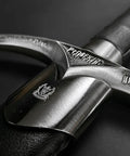 Close-up of 41.25 Inch One Hand Medieval Sword With Dull Carbon Steel Blade, showing engraved hilt and faux leather grip.