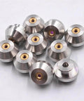 Waterjet orifice nozzle set, stainless steel with brass inserts and purple centers, several pieces