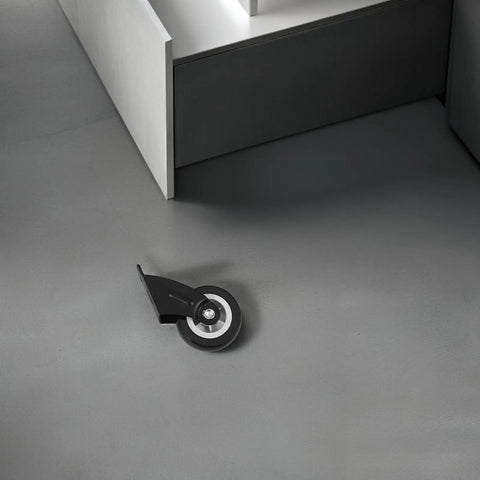 Heavy Duty Slider Wheels Rock Solid Construction For Quiet Barn Door Cabinet Sliding Track gliding wheel on gray floor with black housing.