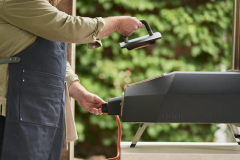 Installing Gas Burner Attachment For Karu 2 Pro Pizza Oven - 28mbar Propane, Includes Regulator and Hose outdoors
