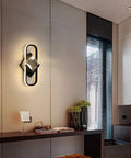 Modern Led Acrylic Indoor Wall Sconce With Dimmable Remote Control And Warm Adjustable Glow Solid Pick For Bedroom Living Room And Office Space mounted above a desk.