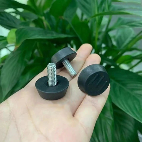 Adjustable Leveling Feet Set For Furniture And Cabinets Black Glide Pads With M6 And M8 Screws Rust Resistant Plastic Bases 4 Pack 8 Pack Multiple Size Options Easy DIY Installation Delivers Stable Leveling On Uneven Floors, black feet in hand