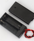 3 Pack Slick Dual AA Battery Case With Built In Toggle Switch And Hookup Wire Leads For Plug And Play Power Setup That Gets The Job Done Without Any Headaches Or Extra Wiring Hassles, black plastic holder, open view.