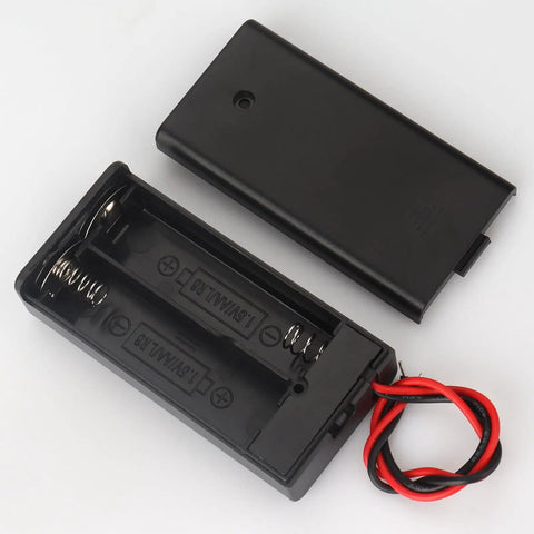 3 Pack Slick Dual AA Battery Case With Built In Toggle Switch And Hookup Wire Leads For Plug And Play Power Setup That Gets The Job Done Without Any Headaches Or Extra Wiring Hassles, black plastic holder, open view.
