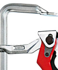 Heavy Duty 20 Inch Lever Clamp With Quick Grab Ratchet Jaw Dead Nuts Cold Drawn Steel Frame close-up showing ratchet mechanism.