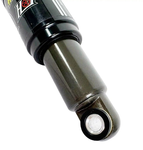 Close-up of rear shock for mountain bikes and e-bikes with 150/165mm travel, 1000lb spring, and hydraulic damper.