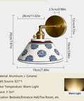 MECOLA Vintage Ceramic Shade Wall Sconce Adjustable Angle Wall Mount Light with blue floral design and gold accents.