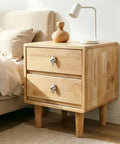 Coastal Conch Cabinet Knobs 4 Pack With Screws Ocean Vibe Zinc Alloy Drawer Pulls on a wooden bedside table