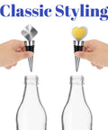 Front view of 8-piece stainless steel wine bottle stopper kit with heart and square-top designs