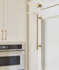 Champagne Bronze Cabinet Knobs 10 Pack Champagne Gold Cabinet Pulls on white kitchen cupboards near oven, solid metal, easy to install.