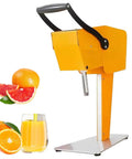 QUGURLID Electric Citrus Juicer Machine For Home Use, yellow commercial-grade fruit press with fresh oranges and juice.
