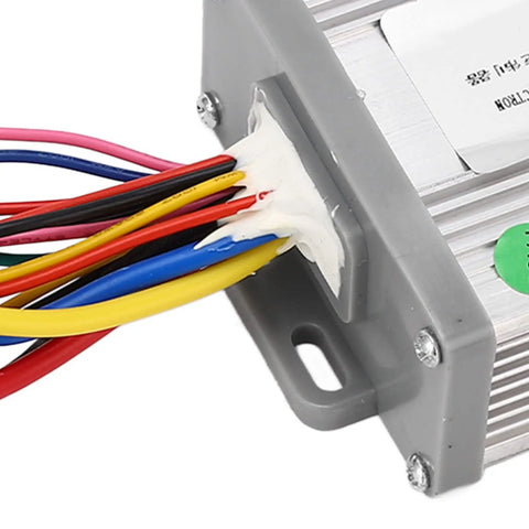 Close-up of 24V 1000W Brushed Electric Speed Controller for E Bike Conversion with wires and aluminum casing.
