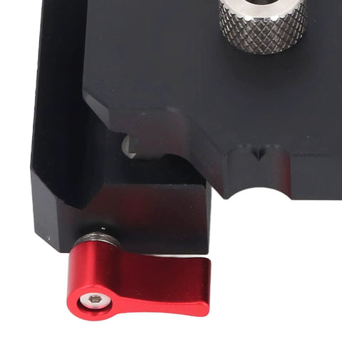 Close-up of adjustable part of Hit The Mark Every Time Self Centering Doweling Jig with red lever for precision drilling.