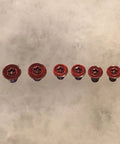 Premium Red Replacement Scale And Pivot Torx Screws For Spyderco Manix 2 G10 Manix 2 XL Set Of 6 viewed from above on white background.