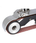 Heavy Duty Electric Belt Sander For Metal Pipes And Tubes Knock Out Gnarly Rust Weld Scars Burrs Fast close-up of sander's abrasive belt wheel.