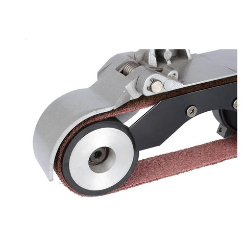 Heavy Duty Electric Belt Sander For Metal Pipes And Tubes Knock Out Gnarly Rust Weld Scars Burrs Fast close-up of sander's abrasive belt wheel.