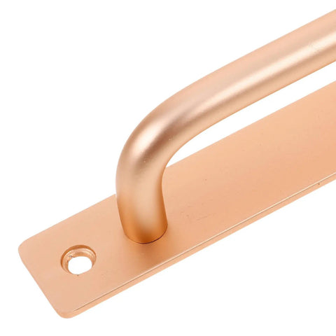 Close-up of gold finish ergonomic aluminum door pull part of Two Pack Aluminum Door Handle Pulls With Ergonomic Design And 128mm Hole Spacing.