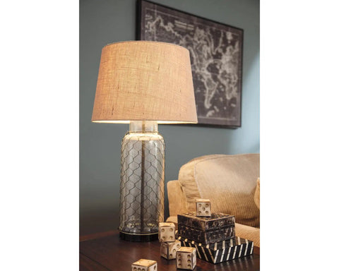 Sharmayne 30.75 Inch Clear Glass Table Lamp With Transparent Glass Shade Vintage Casual Style on wooden side table