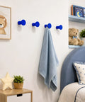 Top Shelf Four Pack Slick Black Round Wall Hooks For Hanging Towels Coats And Hats Modern Minimalist Entryway Decor Rock Solid Home Organization Upgrade with blue towel