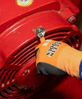 Person using Klein Tools O5064 Extra Capacity Jaw 4 Inch Adjustable Wrench for tight spaces on red equipment with glove