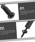 Close-up of stainless steel toilet seat bolts showing screw thread and cap design.
