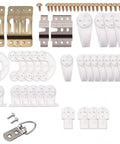 Top Tier Wall Mounting Kit Includes 106 Heavy Duty Picture Hooks Support Up To 20 Pounds On Drywall, assorted hooks and screws arranged neatly.