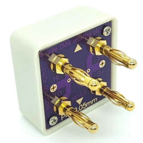 4 Wire DMM Short Socket Verification Tool with gold plated banana connectors on acrylic cube, PCB assembly visible