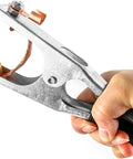 Hand holding Rugged Pro Grade Heavy Duty Welding Ground Clamp For Welder, Copper Electroplated Earth Clamp, side view.
