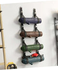 Heavy Duty Adjustable Wall Storage Straps With Badass Rugged Buckles Perfect For Camping Chairs Yoga Mats And Tents holding rolled mats on wall.