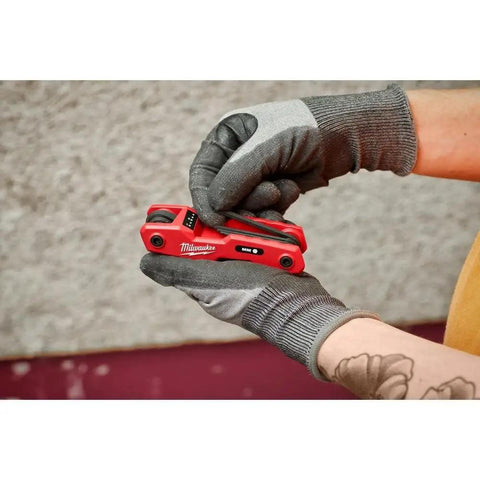 Folding Hex Key Set, 17 Keys, SAE And Metric, Built Tough With All Metal Construction, Heat Treated Alloy Steel, in gloved hands