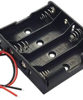 Pack Of Two 4 AA Battery Holders With Pre Installed Wire Leads Delivering Six Volts, black plastic holder with wires for DIY projects.