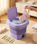No Hustle Foldable Washing Machine With Three Deep Clean Settings And Super Chill Spin Dry for socks clothes towels and delicates in use.