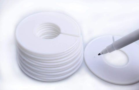 Stack of round white dividers with marker pen; Set Of 20 Closet Size Dividers For Clothing Racks With Marker Pen Included