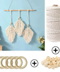 All In One Macrame Kit For Beginners With Natural Cotton Rope 3mm x 220 Yards A Complete Wall Hanging Set Including Wooden Beads, Rings, Sticks, S Hooks And Easy DIY Guide showing cotton rope, wooden rings, and beads with wall hanging example.