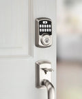 Aura Bluetooth Programmable Keypad Door Lock Deadbolt With SmartKey Security in Satin Nickel on a white door