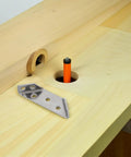 Three Sided Stainless Steel Corner Bracket on wooden surface, showcasing Heavy Duty Shelf and Cabinet Support.