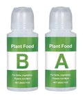Pro Grade Hydroponic Nutrients A And B For Indoor Plants Fertilizer bottles labeled A and B for hydroponics solutions.