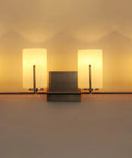 Dart 4 Light Bath Vanity Fixture In Satin Nickel Steel Finish With Satin White Glass Shades mounted on wall