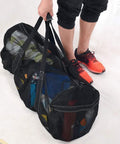 Person carrying XXL Mesh Duffle Bag for scuba snorkel gear and water sports equipment, showcasing ultra roomy design.