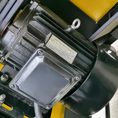 Close-up of 4000W electric rebar bender machine motor showing three phase induction motor details.
